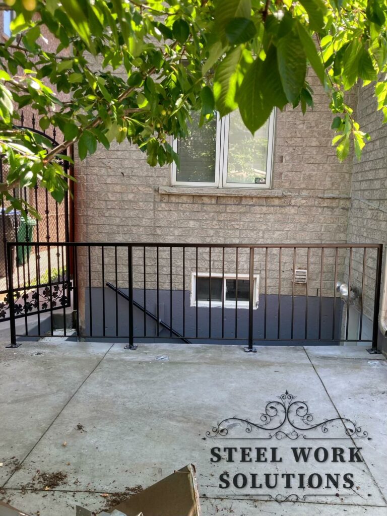 Basement Entrance Railing Designed, Fabricated, and Installed in Brampton, ON by Steel Work Solutions
