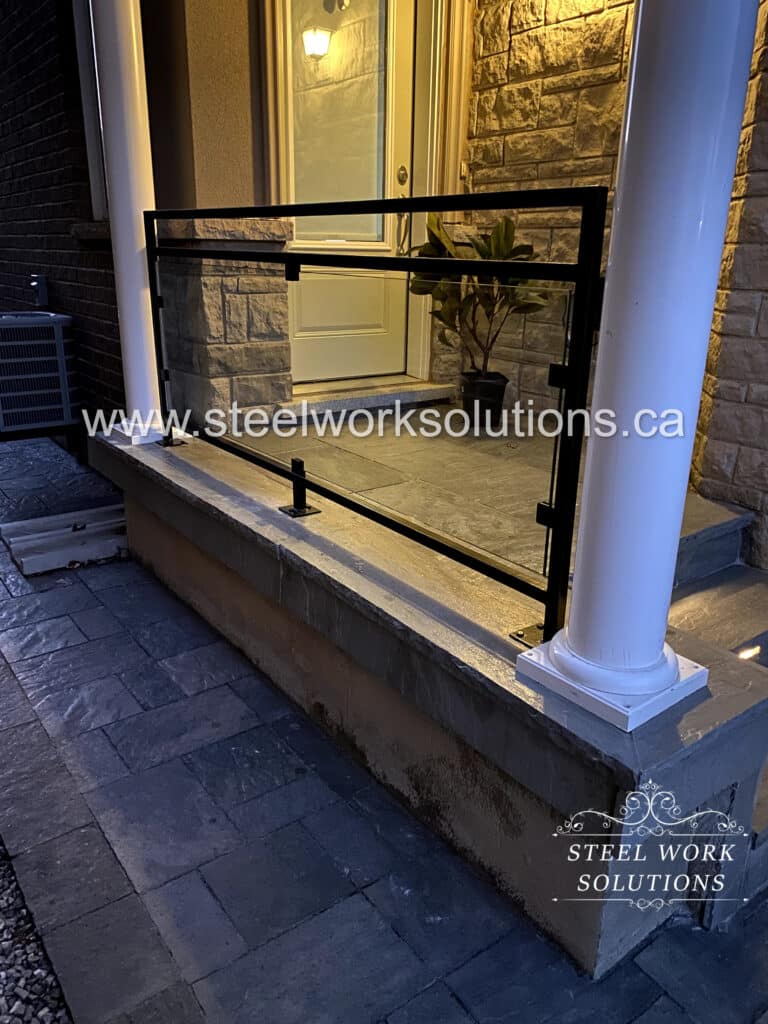 Custom Glass & Wrought Iron Porch Railing designed, fabricated, and installed by Steel Work Solutions in Burlington, ON.