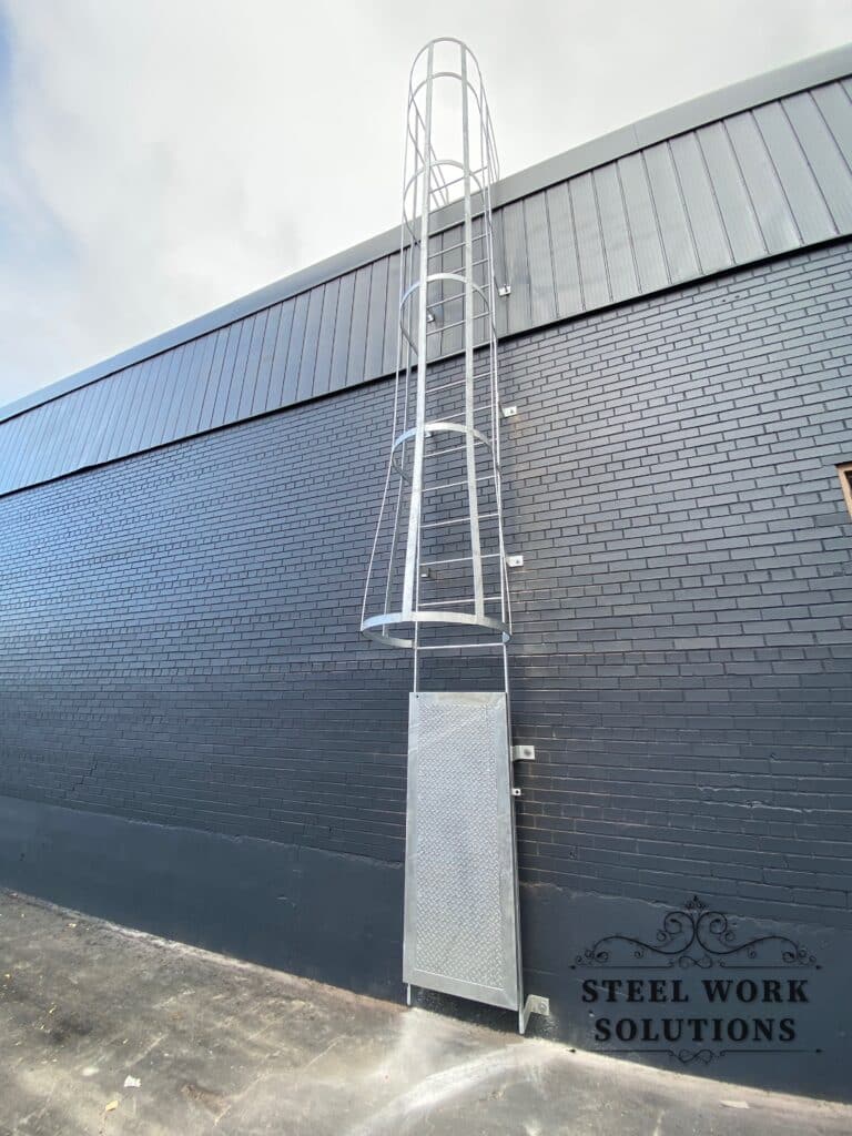 Commercial wrought iron roof ladder fabricated and installed in Brampton, ON by Steel Work Solutions
