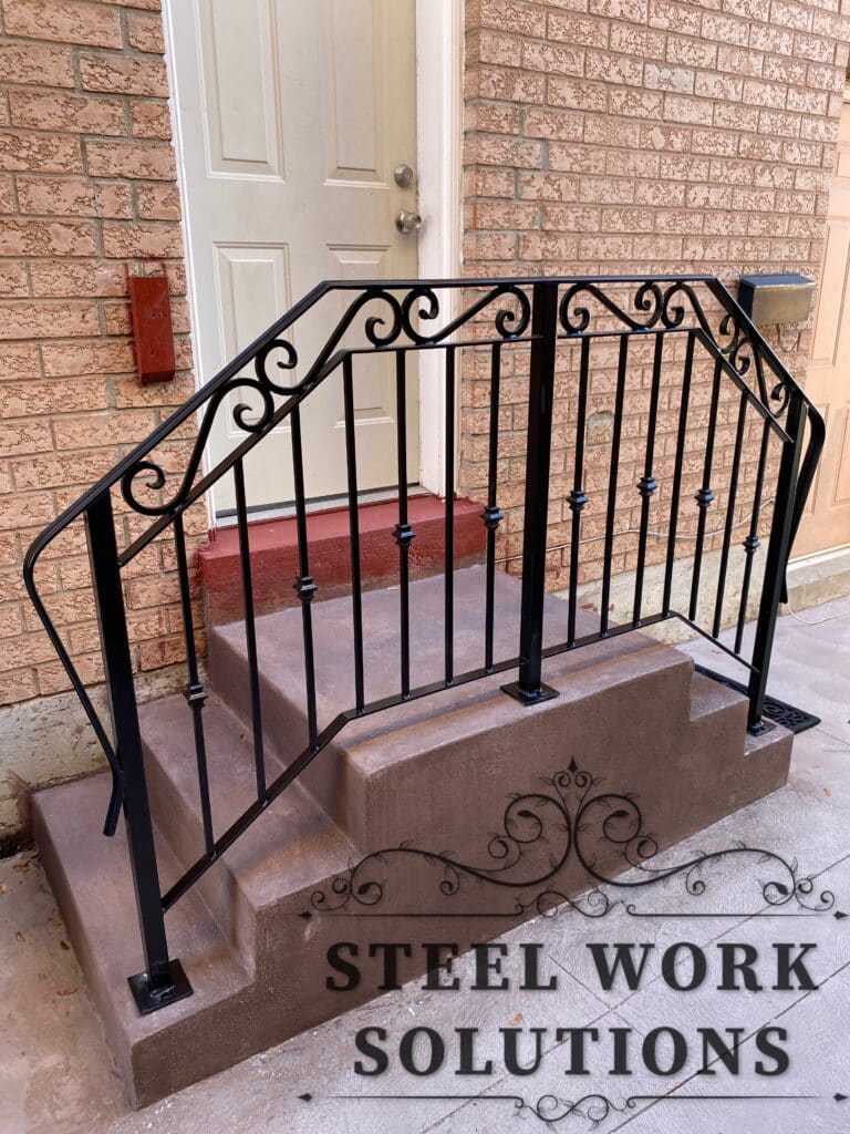 Wrought iron porch railing designed and fabricated by Steel Work Solution, galvanized and finished with matte black, installed at a residential property in Mississauga, ON