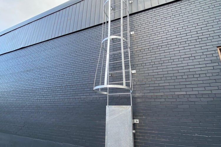 Commercial wrought iron roof ladder fabricated and installed in Brampton, ON by Steel Work Solutions